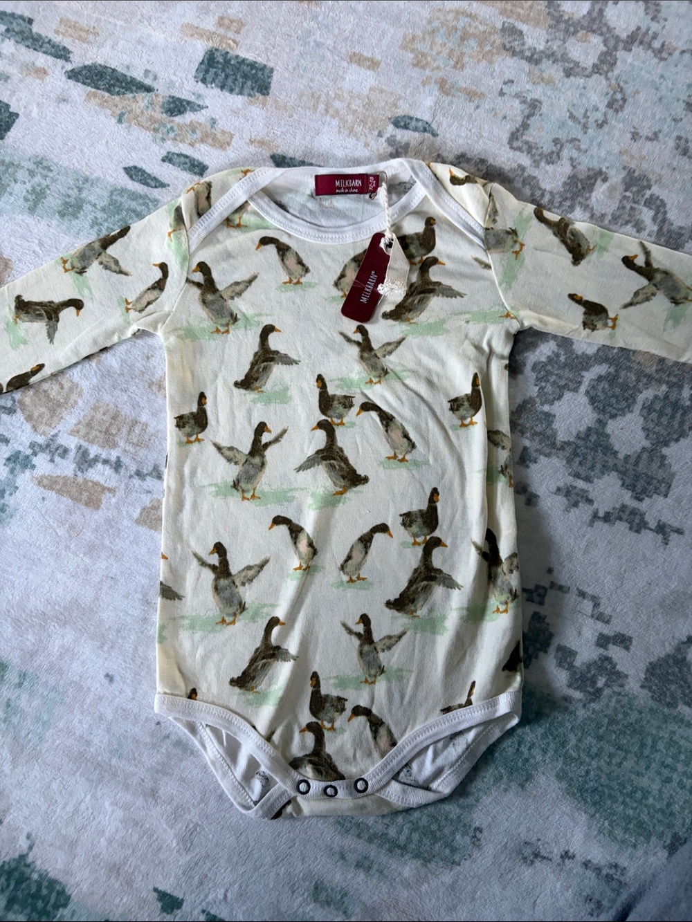 Milk Barn Cream Duck-Print Long-Sleeve One-Piece Bodysuit